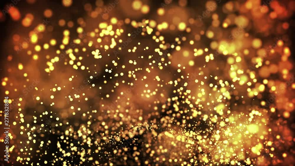 Aufkleber gold particles in liquid float and glisten. background with glittering golden particles depth of fie