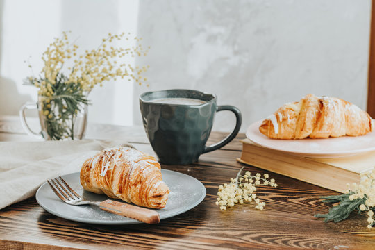Continental traditional breakfast with croissants and coffee