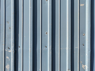 Blue peeling metal siding