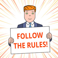 Handwriting text Follow The Rules. Conceptual photo go with regulations governing conduct or procedure Smiling Man Holding Formal Suit Big Blank Poster Board in Front of Himself
