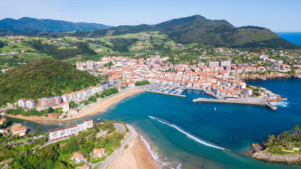 aerial view of basque fishing town and its coastline