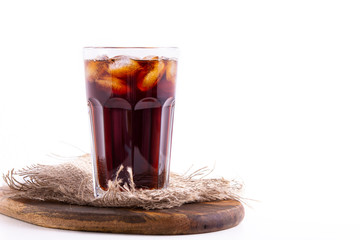 glass with cola or ice coffee with ice on a white background