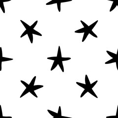 Seamless stars pattern. Hand drawn star doodles texture background.