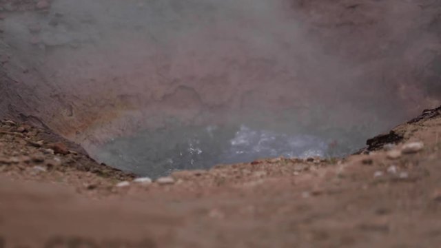 Close up shot of a Geysir termal water boiling