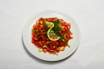 Salad varieties of Turkish cuisine. Tomatoes, peppers, carrots, lettuce, cucumbers and other varieties.