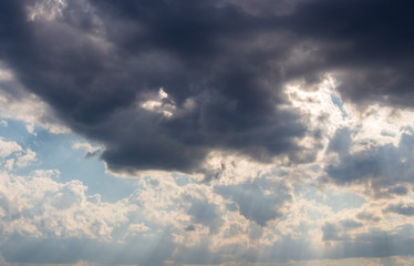 Cumulus clouds, dramatic sky.