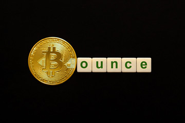 Word Bounce made up of cubes. The first letter of the word is symbolized by a bitcoin coin. Concept of strong BTC, bitcoin growth rate, price increase, blockchain confidence, positive price outlook. - obrazy, fototapety, plakaty