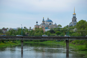 Torzhok, Russia - May, 15, 2019: image of the bridge and passing cars in Torzhok, Russia