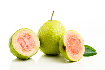 Red guava cut on white background.
