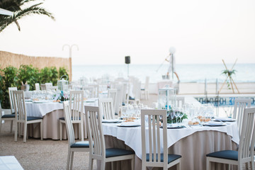 Decorated tables for a wedding reception at beach resort