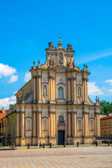 Fototapeta na wymiar Warsaw, Poland - Front view of the rococo Visitationist St. Joseph Church – known as Kosciol Wizytek - at the Krakowskie Przedmiescie street in the Old Town quarter of Warsaw