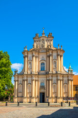 Fototapeta na wymiar Warsaw, Poland - Front view of the rococo Visitationist St. Joseph Church – known as Kosciol Wizytek - at the Krakowskie Przedmiescie street in the Old Town quarter of Warsaw