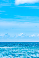 Beautiful outdoor swimming pool in hotel resort with white cloud and blue sky for leisure relax