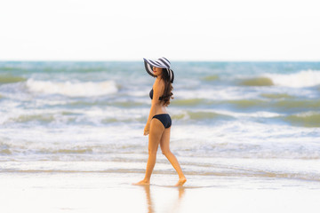 Portrait beautiful young asian woman wear bikini on the beach sea ocean