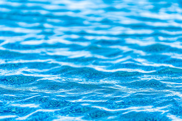 Abstract background surface and texture of swimming pool water