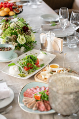 Gala dinner, serving table for birthday or wedding. Different meals for the guests on Banquet. delicious dishes on the table in the restaurant.