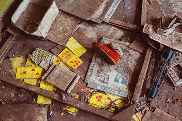 Chernobyl Exclusion Zone, Ukraine. Old broken children toys in kindergarten, nursery school....