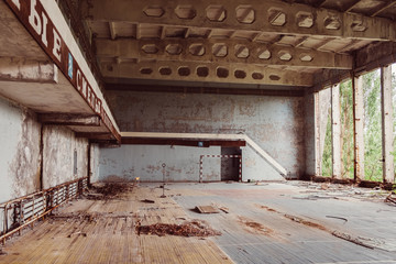 Chernobyl Exclusion Zone / Ukraine - July 2016: School gym in destroyed abandoned ghost city...