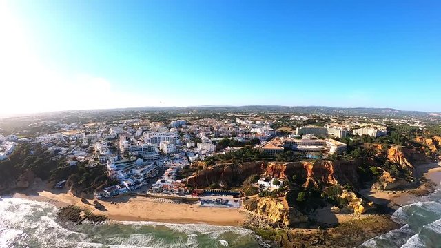 Aerial view on hotel zone and Coast of Atlantic Ocean in Albufeira Algarve Portugal. View on beach from above
