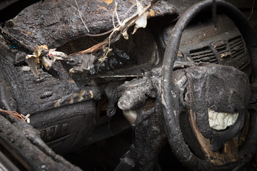passenger compartment after the fire, partially burned down parts of the car