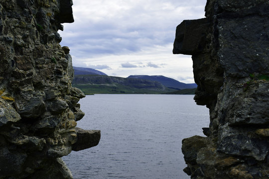 Rocks with ocean/lake in between photograph