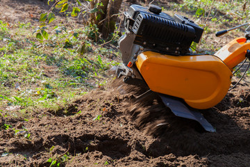 An aerator machine working in the yard