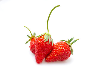 Red strawberries with a white background..