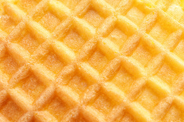 Delicious waffle for breakfast as background, closeup