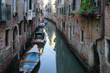 Fototapeta na wymiar Afternoon view of a canal in Venice, Italy