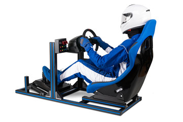 race driver in blue overall with helmet training on simracing aluminum simulator rig for video game...