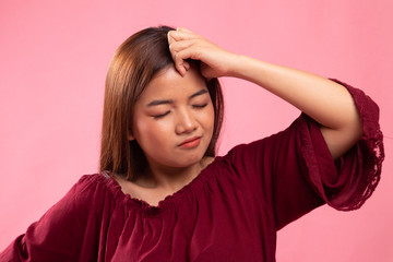 Young Asian woman got sick and  headache.