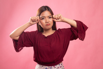 Young Asian woman sad and cry.
