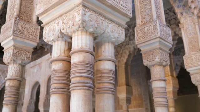 Patio De Los Leones Pillars Showcasing Detailed Islamic Architecture in Granada, Spain