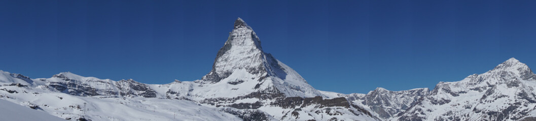 Panoramic view of the Matterhorn in blue sky background in winter