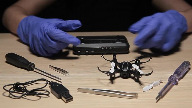 hand glove quadcopter table background hd footage 