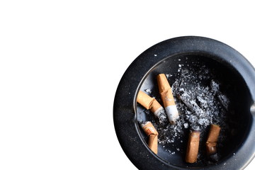 cigarette in an ashtray on right white background 