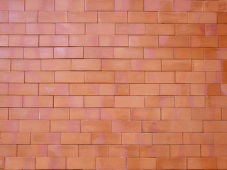 Fototapeta premium Red moss brick wall is used as a background.
