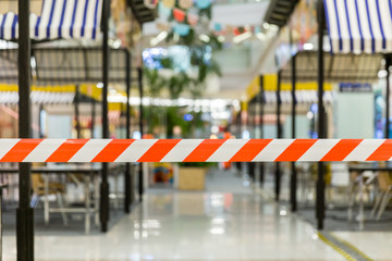 Red and White Lines of barrier tape. Striped, red and white tape that forbids passage. Red White warning tape pole fencing is protects for No entry.