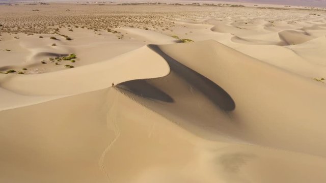 Aerial drone footage of the sand dunes in Death Valley, California, USA.