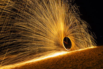 Fire dancers Swing fire dancing show at night fire show on the beach, Koh Samet, Thailand.