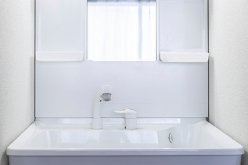 .New white ceramic wash basin, clean and plastic lockers