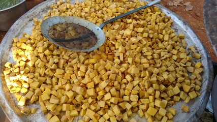 elephant foot yam pieces to cook a south Indian recipe in a traditional marriage