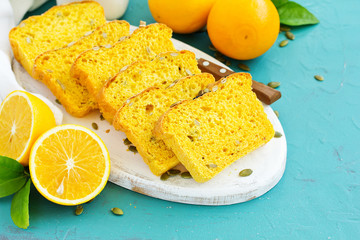 Homemade pumpkin bread with seeds and orange peel.