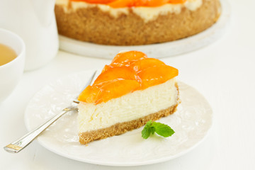 Cheesecake with peaches .. Selective focus.