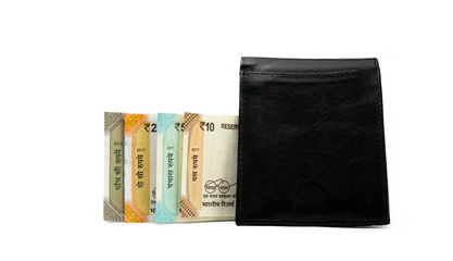 Indian rupee notes with black leather wallet isolated on white background.Success and got profit from business