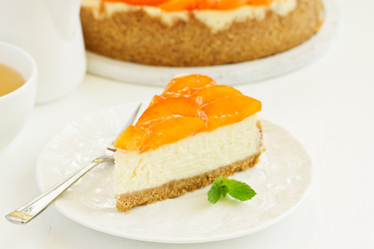 Cheesecake with peaches .. Selective focus.