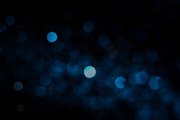 Abstract blue bokeh  texture on black
