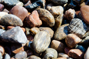 The texture of stones of different breeds, pebbles