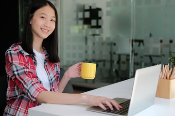 girl teenager college high school student studying with computer