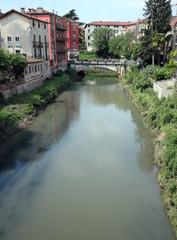 Retrone river in Vicenza City in Italy and the Saint Paul Bridge